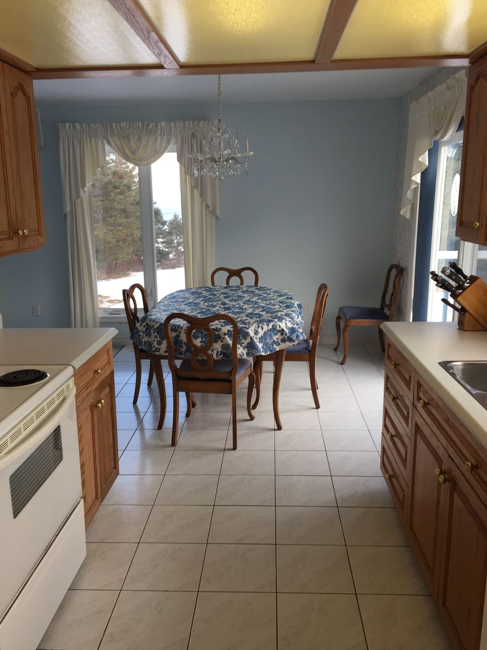 Kitchen and view of dining room.