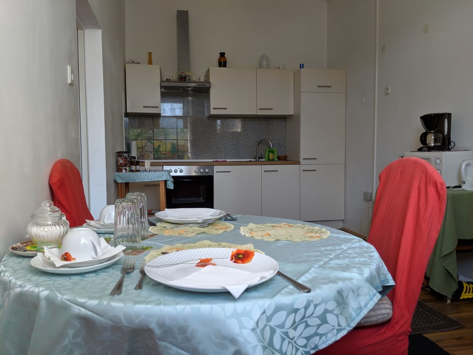 Apartment, Garden View | Private kitchen | Full-size fridge, microwave, oven, stovetop