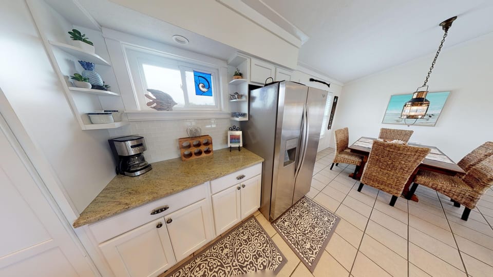 Convenient coffee bar and refrigerator with ice maker and water dispenser