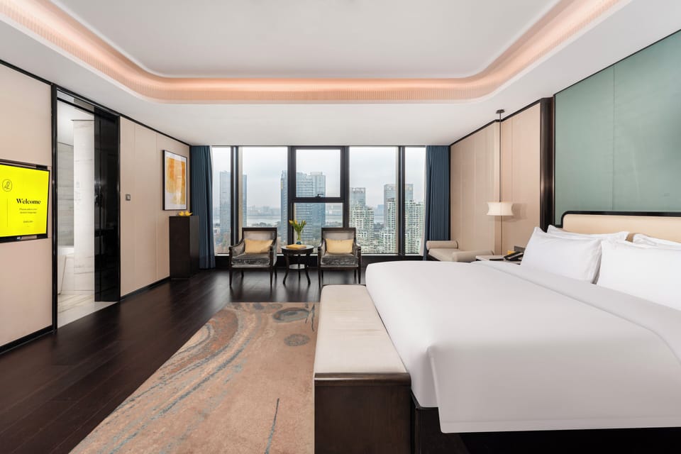 Premium bedding, pillowtop beds, minibar, in-room safe