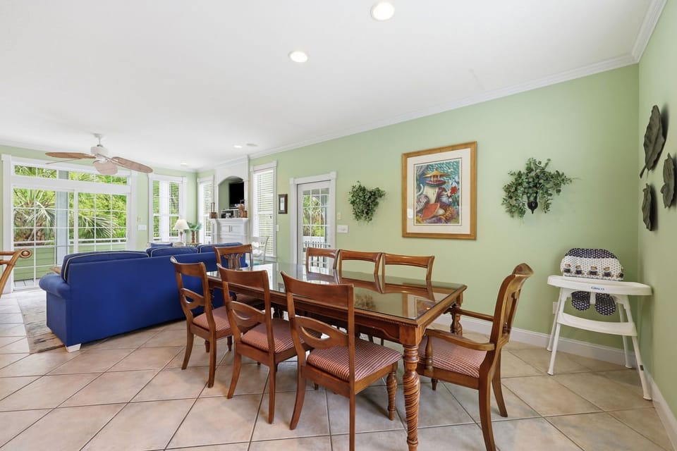 Gather around this spacious dining table where your group can share meals and make memories. The bright, airy space flows naturally into the cozy living area, creating the perfect setting for relaxing together.