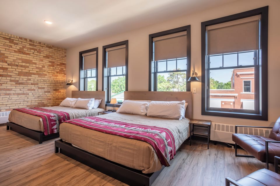 Room 15 @ 102 West Main Street | Premium bedding, individually decorated, individually furnished