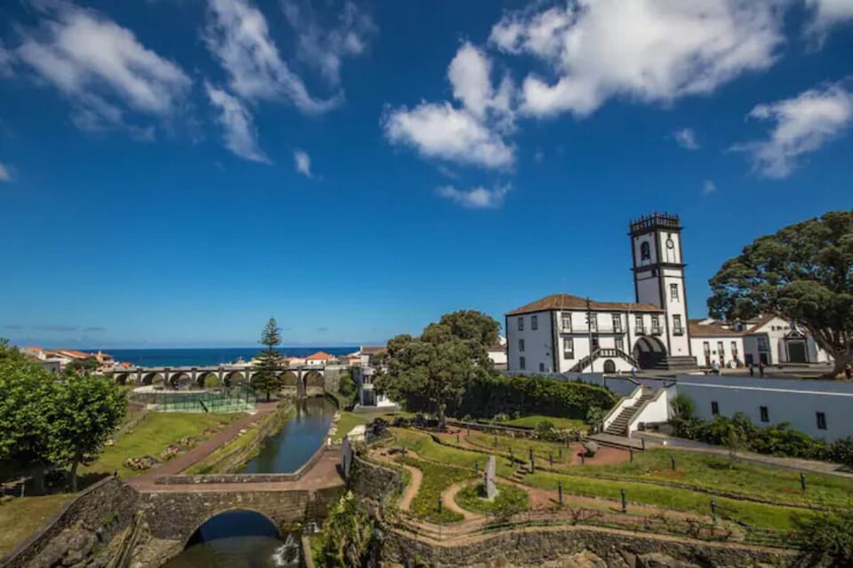 Nearby Town of Ribeira Grande with the 8 arch bridge on the background
