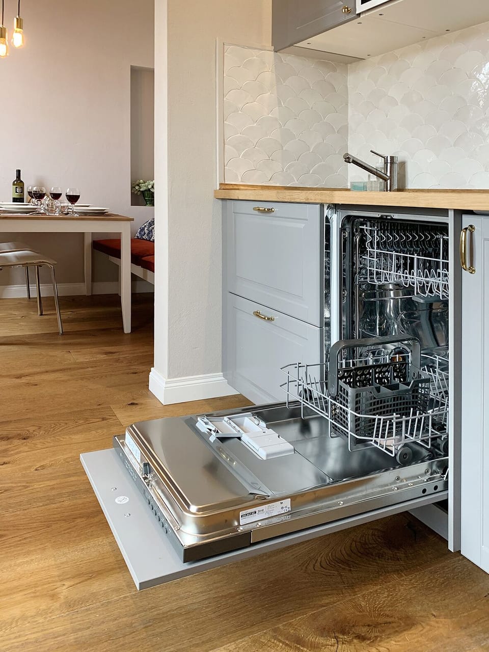 Kitchen, fridge-freezer, induction stove, toaster, dishwasher, microwave