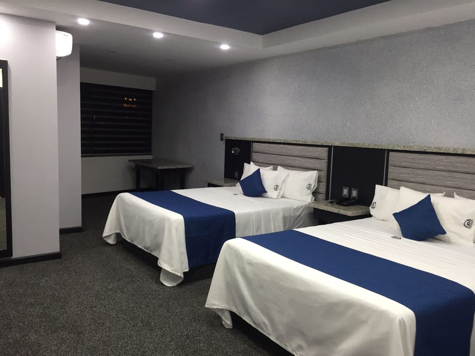 Deluxe Double Room, 2 Queen Beds | Premium bedding, memory foam beds, laptop workspace, iron/ironing board