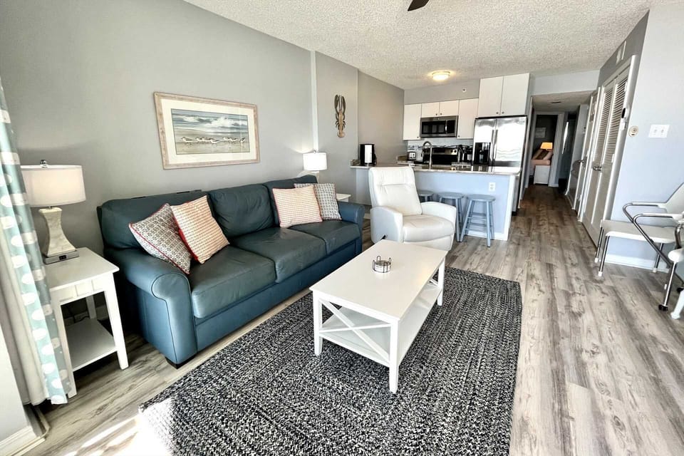 Open living / dining / kitchen.