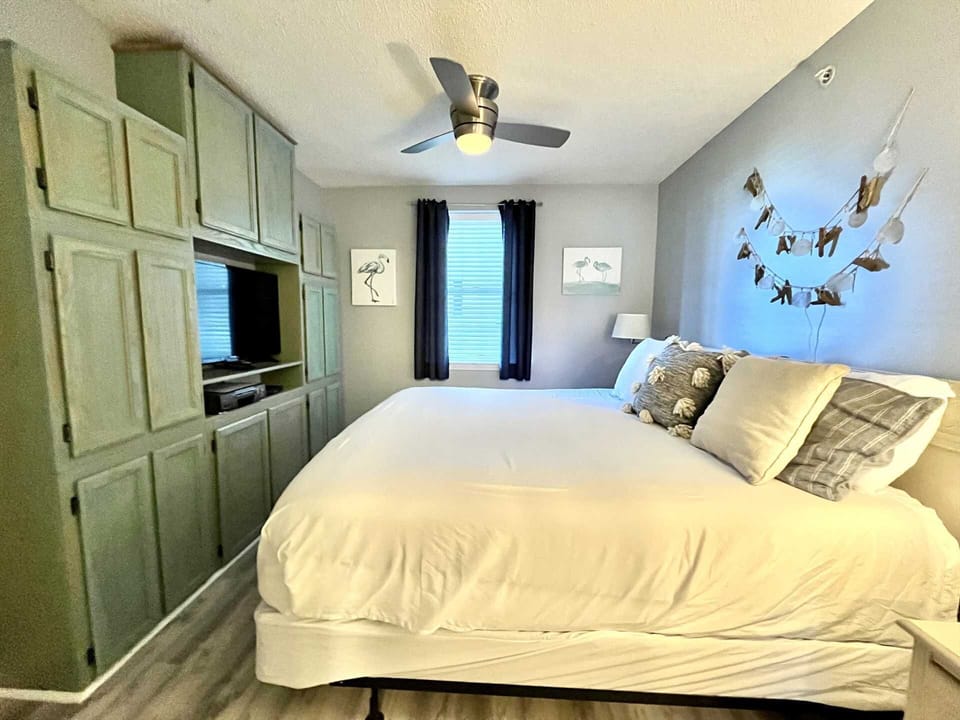 The master bedroom includes a flat screen cable TV, great storage cabinets, and a closet.