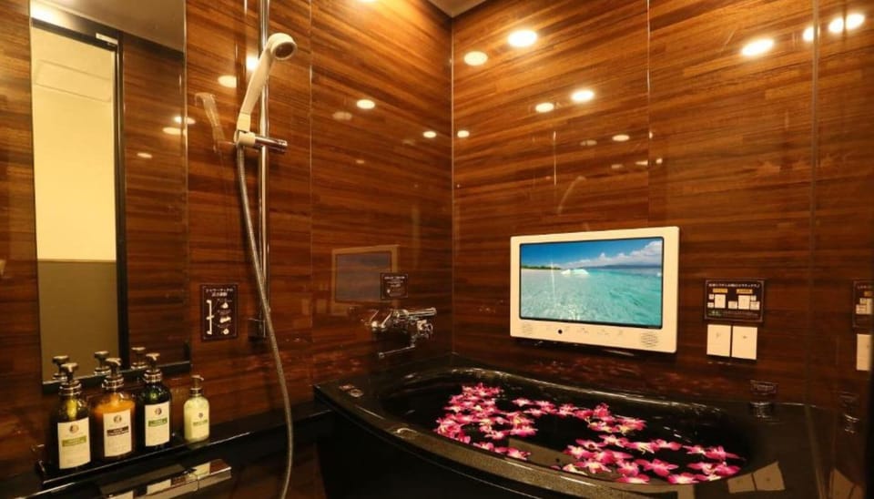 Separate tub and shower, deep soaking tub, designer toiletries