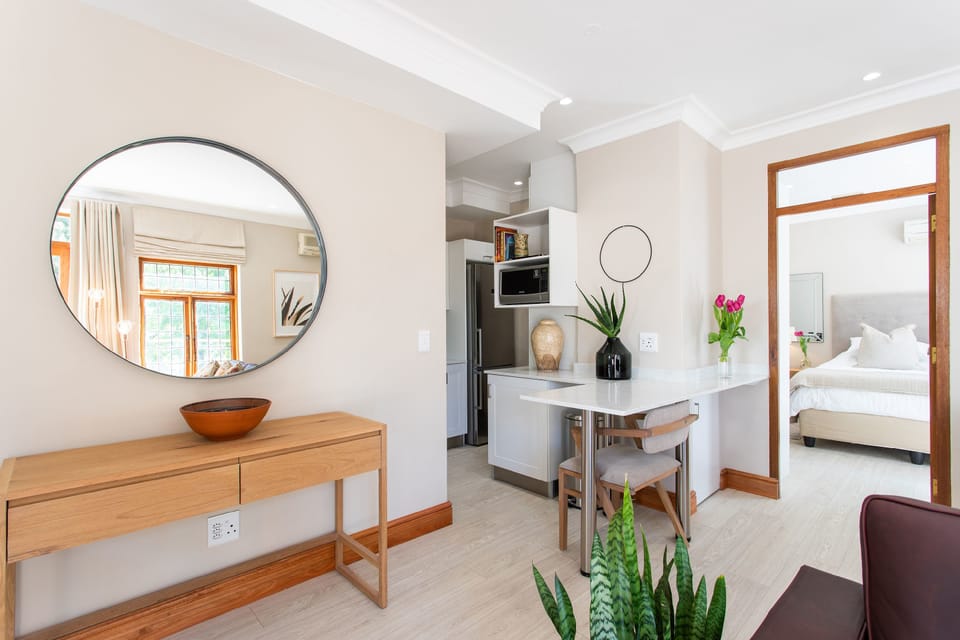 Luxury Apartment, Balcony, Mountain View | Living area | 50-inch Smart TV with cable channels, TV