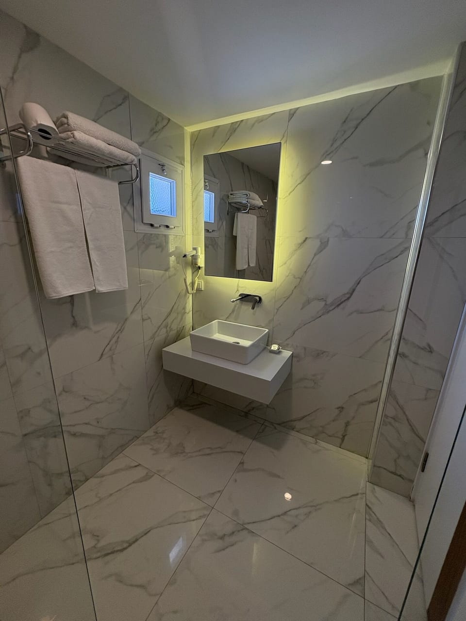 Shower, free toiletries, hair dryer