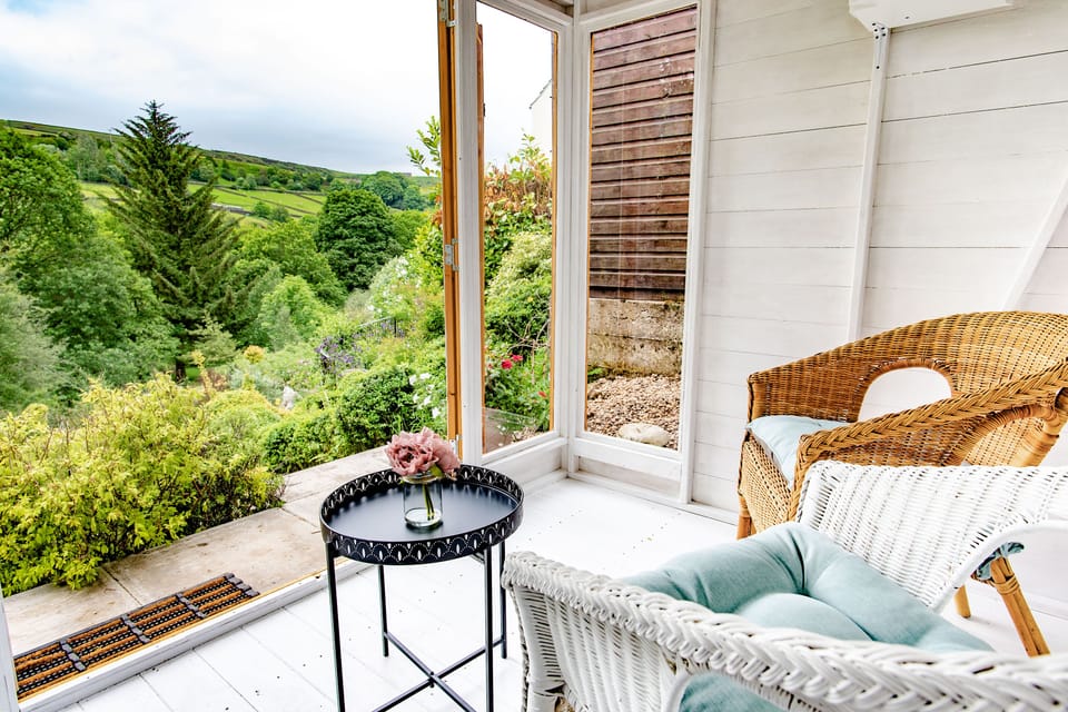 Inside the summer house, lovely for a morning coffee on a sunny day