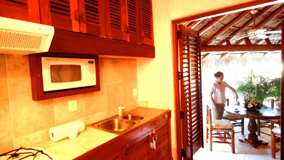 Superior Suite, 1 King Bed, Garden View | Private kitchen | Full-size fridge, microwave, oven, stovetop