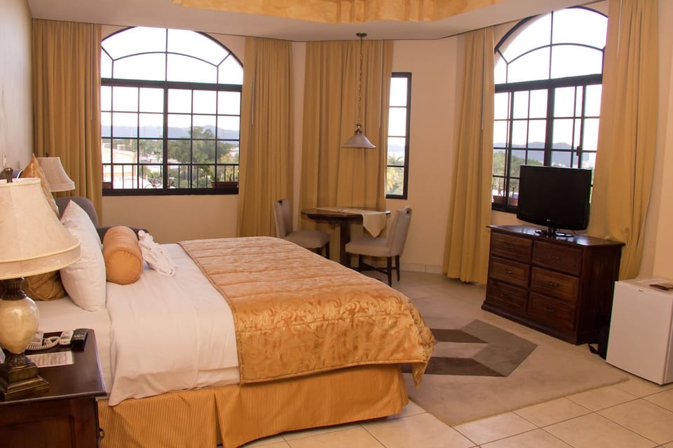 Superior Suite, 1 King Bed, Accessible, City View | Living room | LCD TV