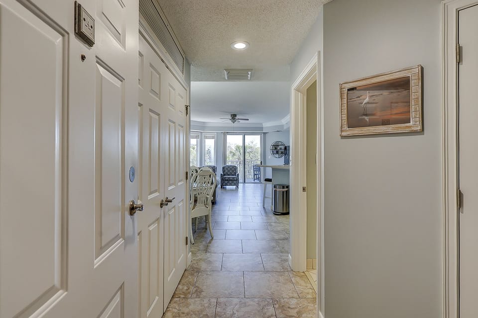 Hallway to Living Room, Dining and Kitchen Area
