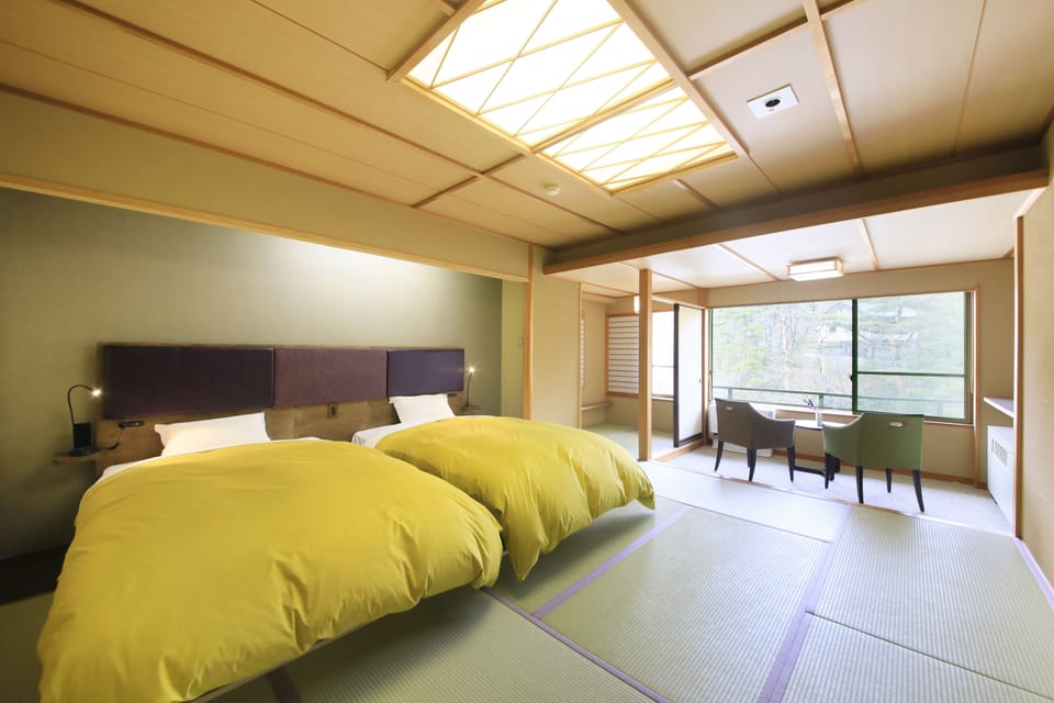 Japanese style twin room non-smoking | Down comforters, in-room safe, desk, blackout drapes