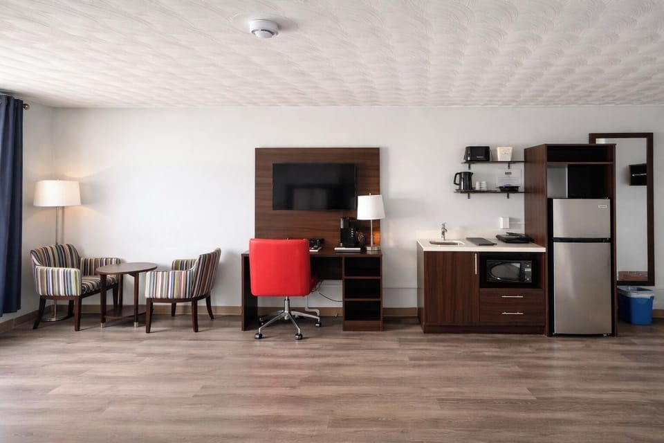 Room, 2 Queen Beds, Non Smoking, Kitchenette | Private kitchen | Mini-fridge, microwave, coffee/tea maker, freezer