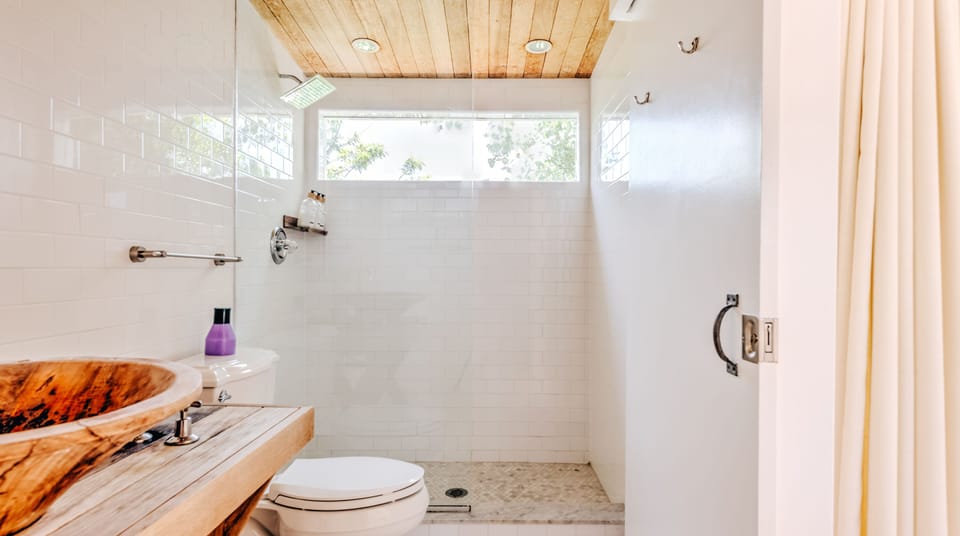 Shower, rainfall showerhead, hair dryer, towels