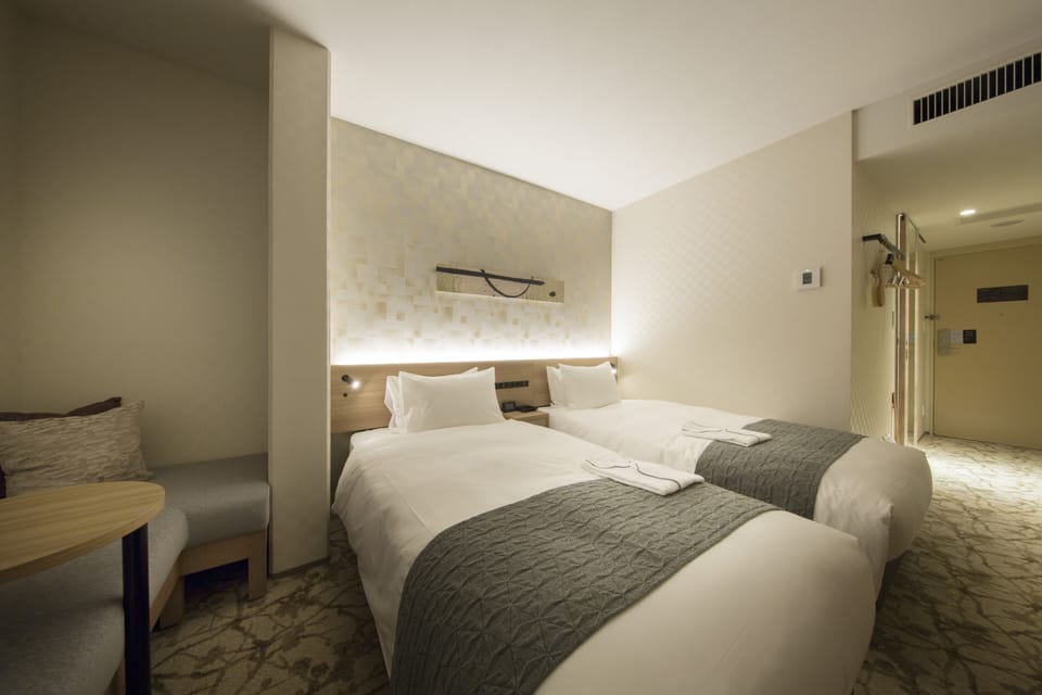 Twin Room, Non Smoking | 1 bedroom, down comforters, in-room safe, blackout drapes