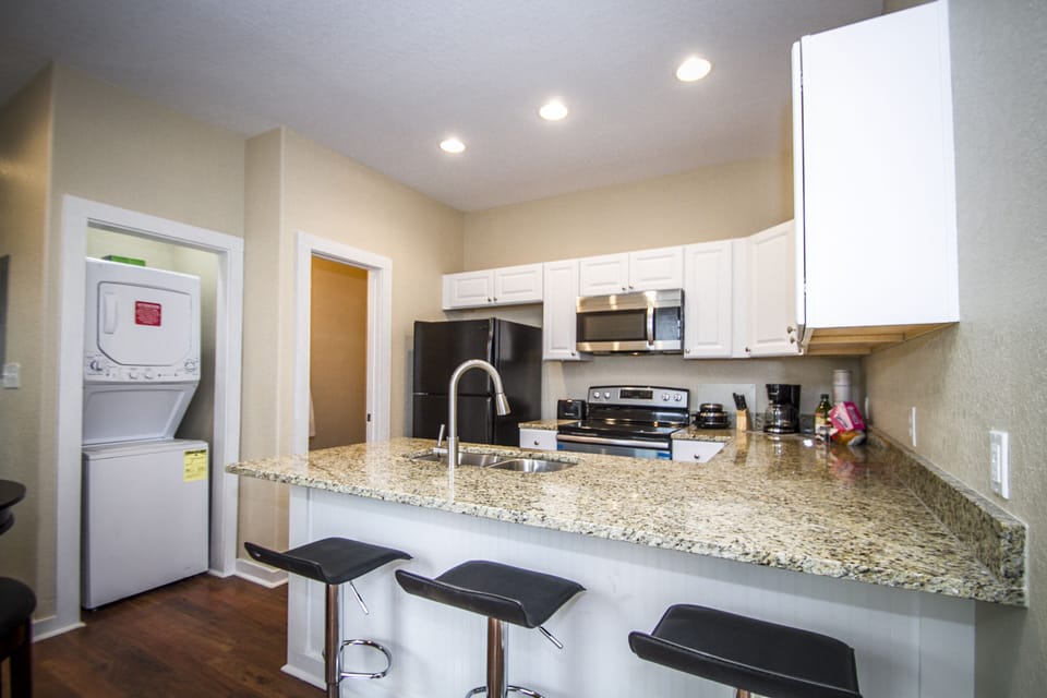 Fridge, microwave, oven, cleaning supplies