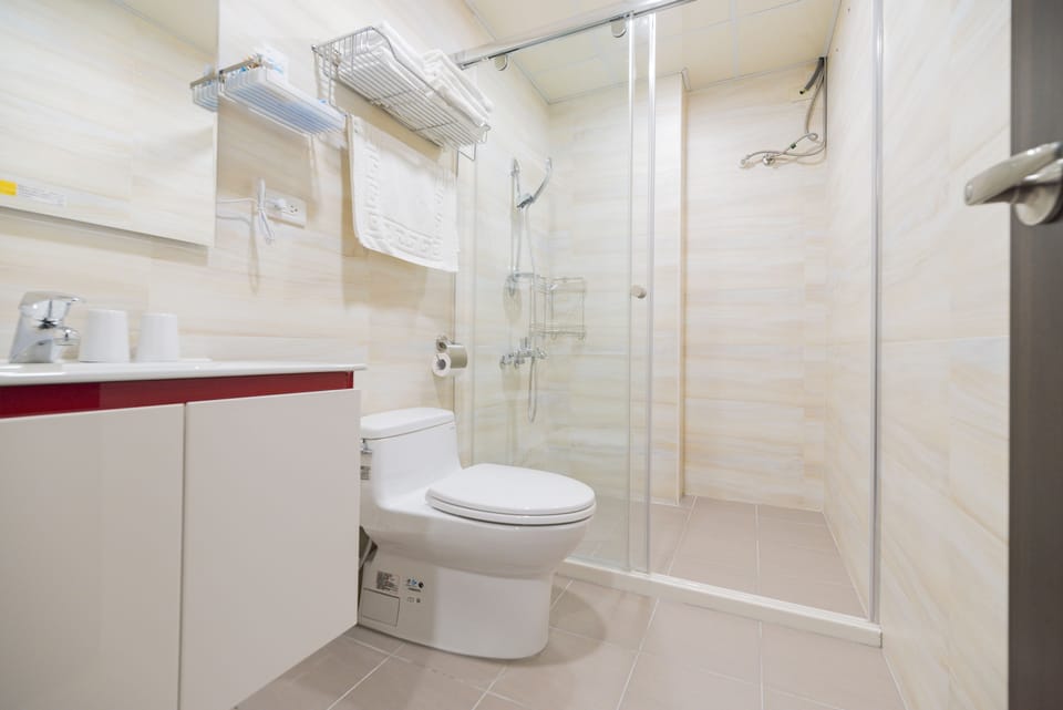 Shower, free toiletries, hair dryer, slippers