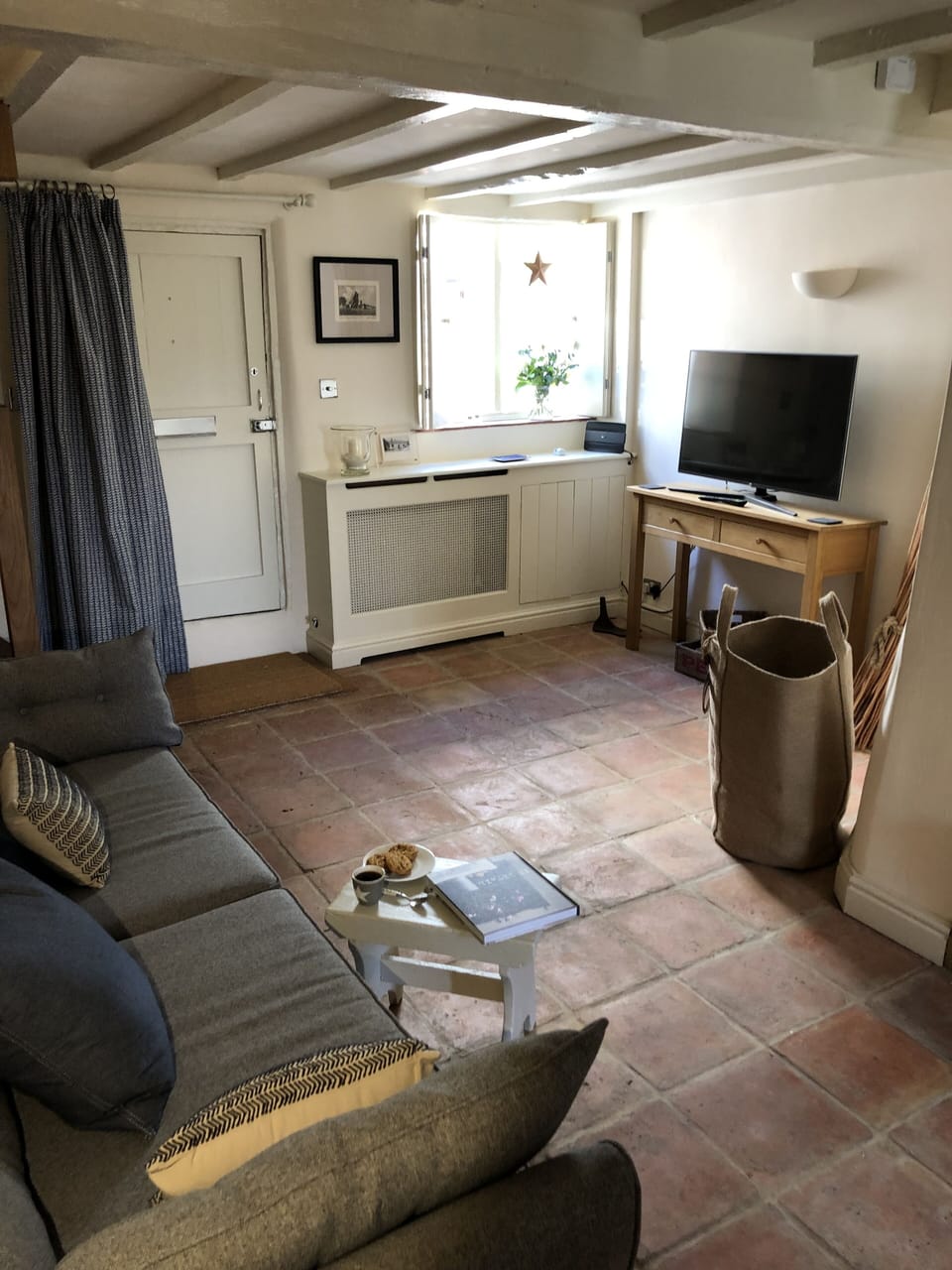 Lounge area with terracotta Quarry Tiled floor