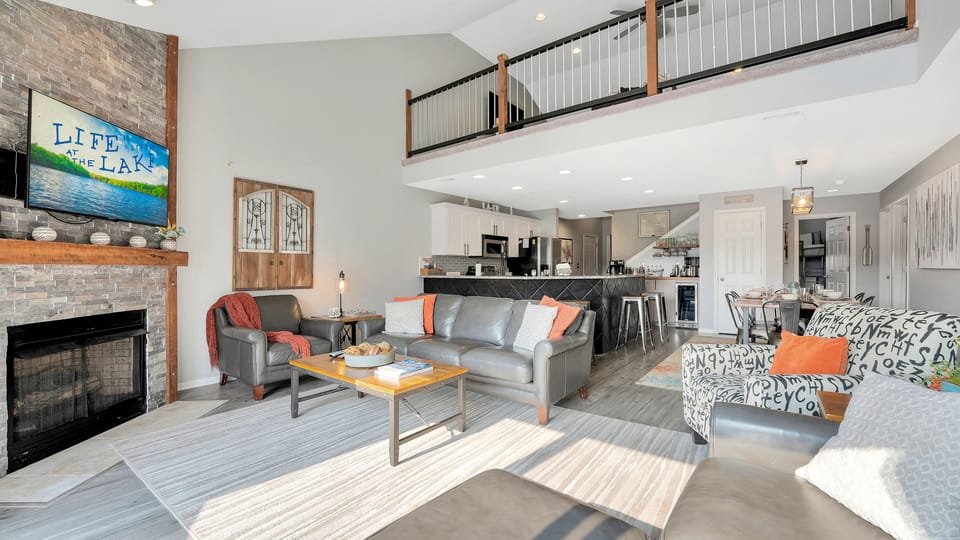 Living area with loft above 