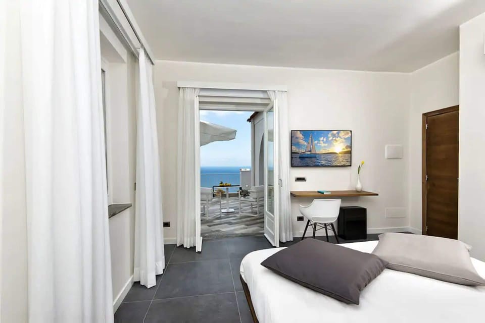 Down comforters, minibar, desk, laptop workspace