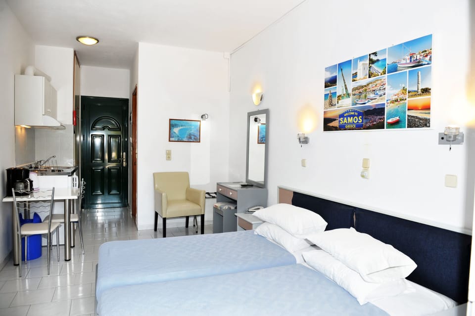 Blackout drapes, soundproofing, iron/ironing board