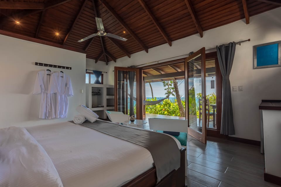 Luxury Villa, Ocean View | Minibar, in-room safe, desk, laptop workspace