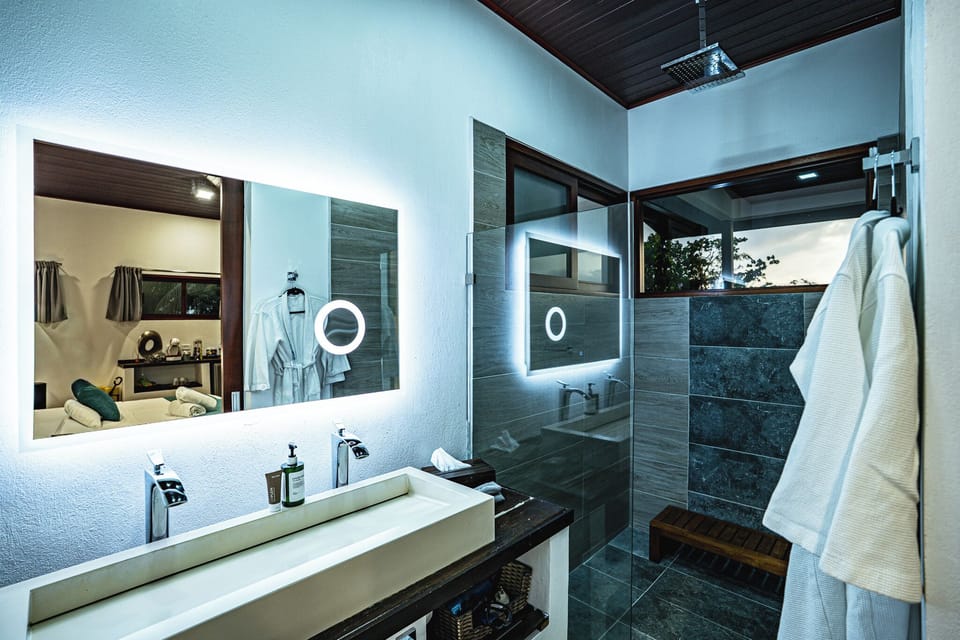 Shower, eco-friendly toiletries, slippers, towels