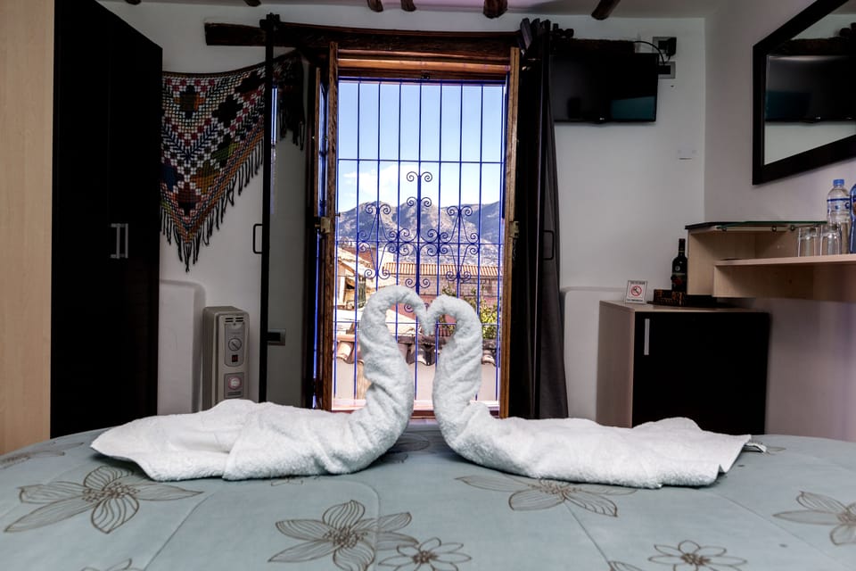 Frette Italian sheets, down comforters, pillowtop beds, minibar