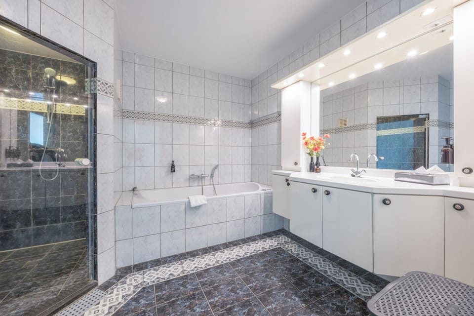 Suite, Terrace, Sea View | Bathroom | Combined shower/tub, eco-friendly toiletries, hair dryer, towels