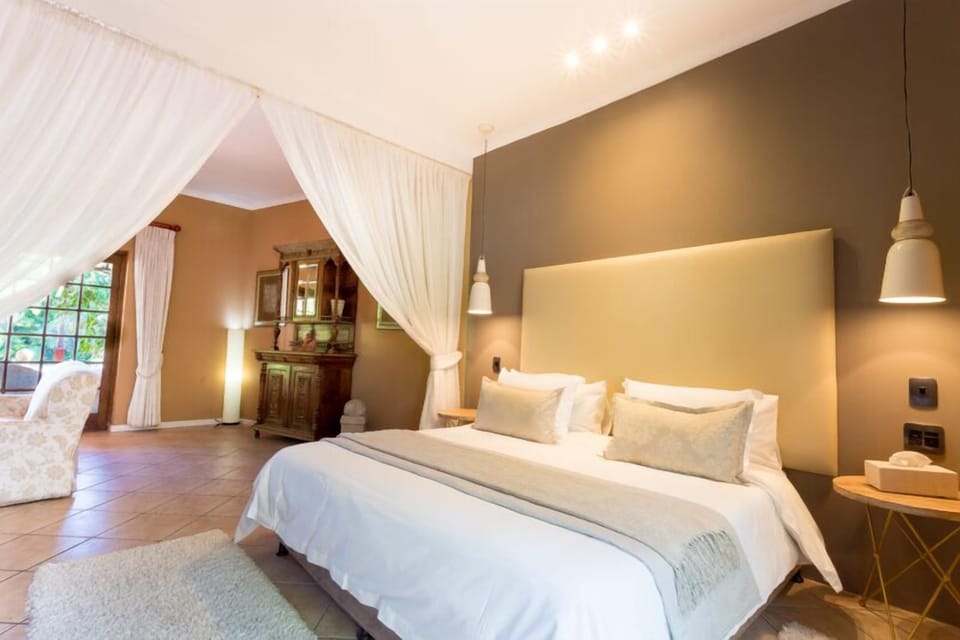 C. Honeymoon Suite | Minibar, in-room safe, desk, iron/ironing board