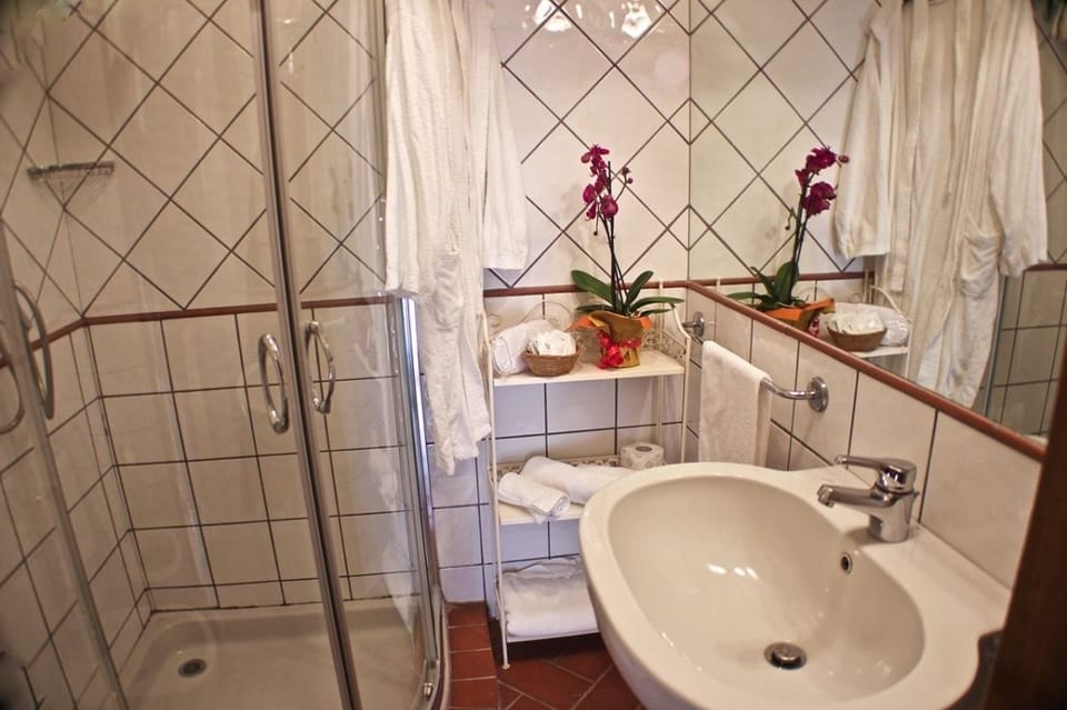 Apartment, Ground Floor (Dino) | Bathroom | Shower, free toiletries, hair dryer, bidet