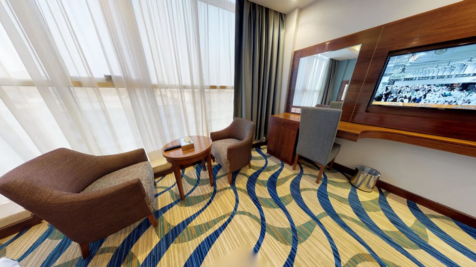 Superior Double Room | Living area | Flat-screen TV