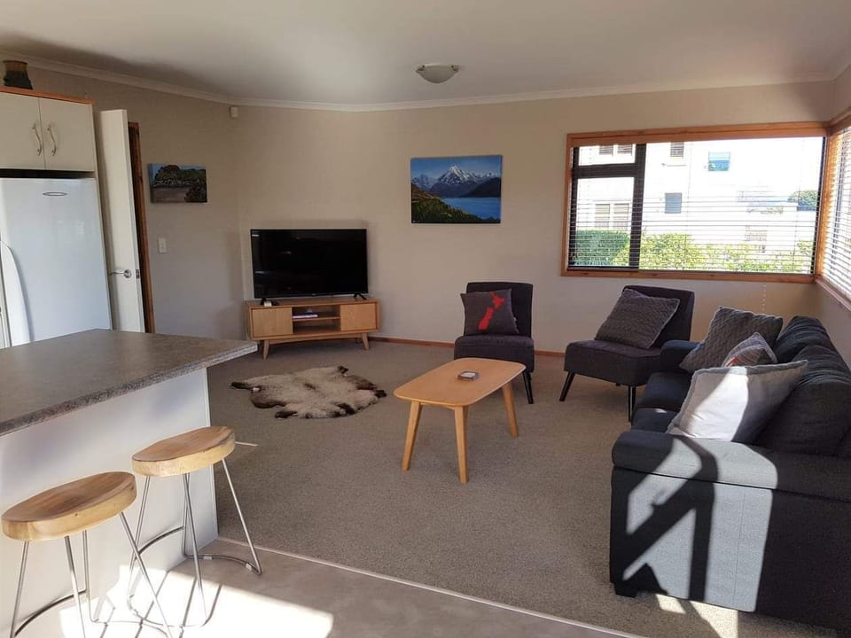 Downstairs lounge with a double sofa-bed & a single bed.