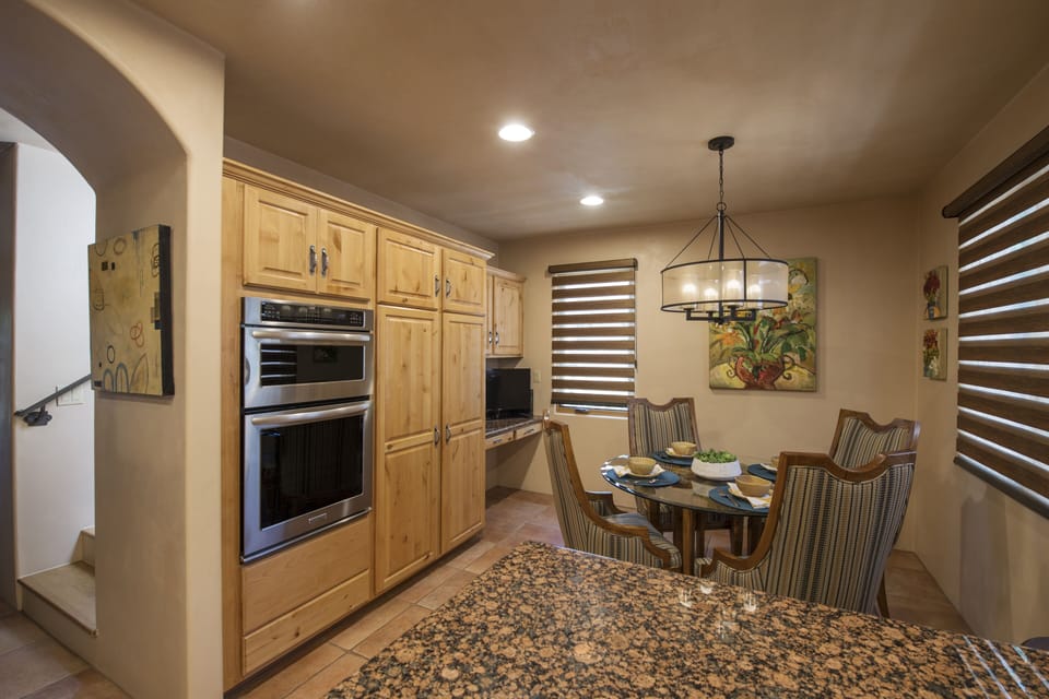 Stainless appliances with abundant pantry space, paper products provided