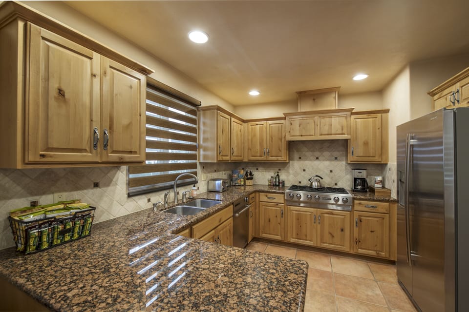 Kitchen equipped with Jenn Air appliances. High standard cookware also provided