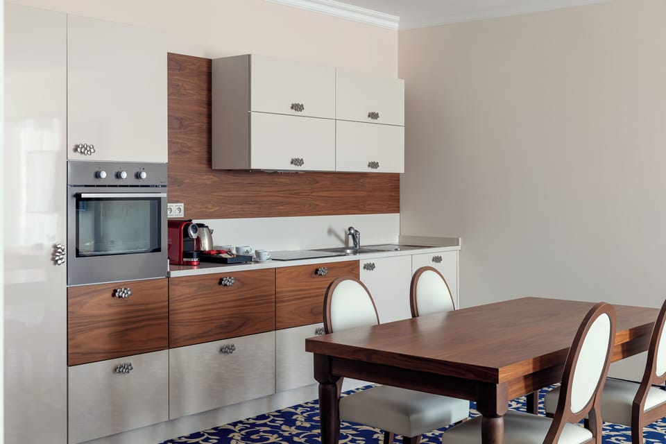 Presidential Suite | Private kitchen | Coffee/tea maker, electric kettle, highchair