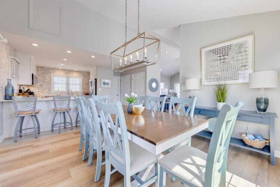 Picture yourself gathered around this spacious table, sunlight streaming through the windows as laughter fills the open, breezy space. Perfect for meals and memories with loved ones.