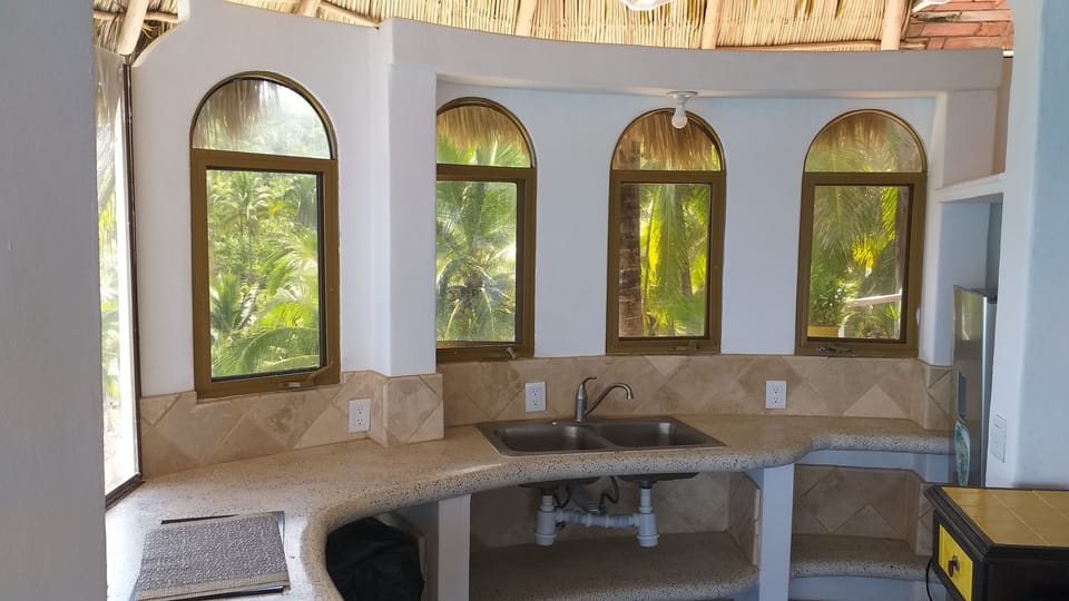 Panoramic Room, 1 King Bed, Ocean View | Private kitchen | Fridge, stovetop, coffee/tea maker, cookware/dishes/utensils