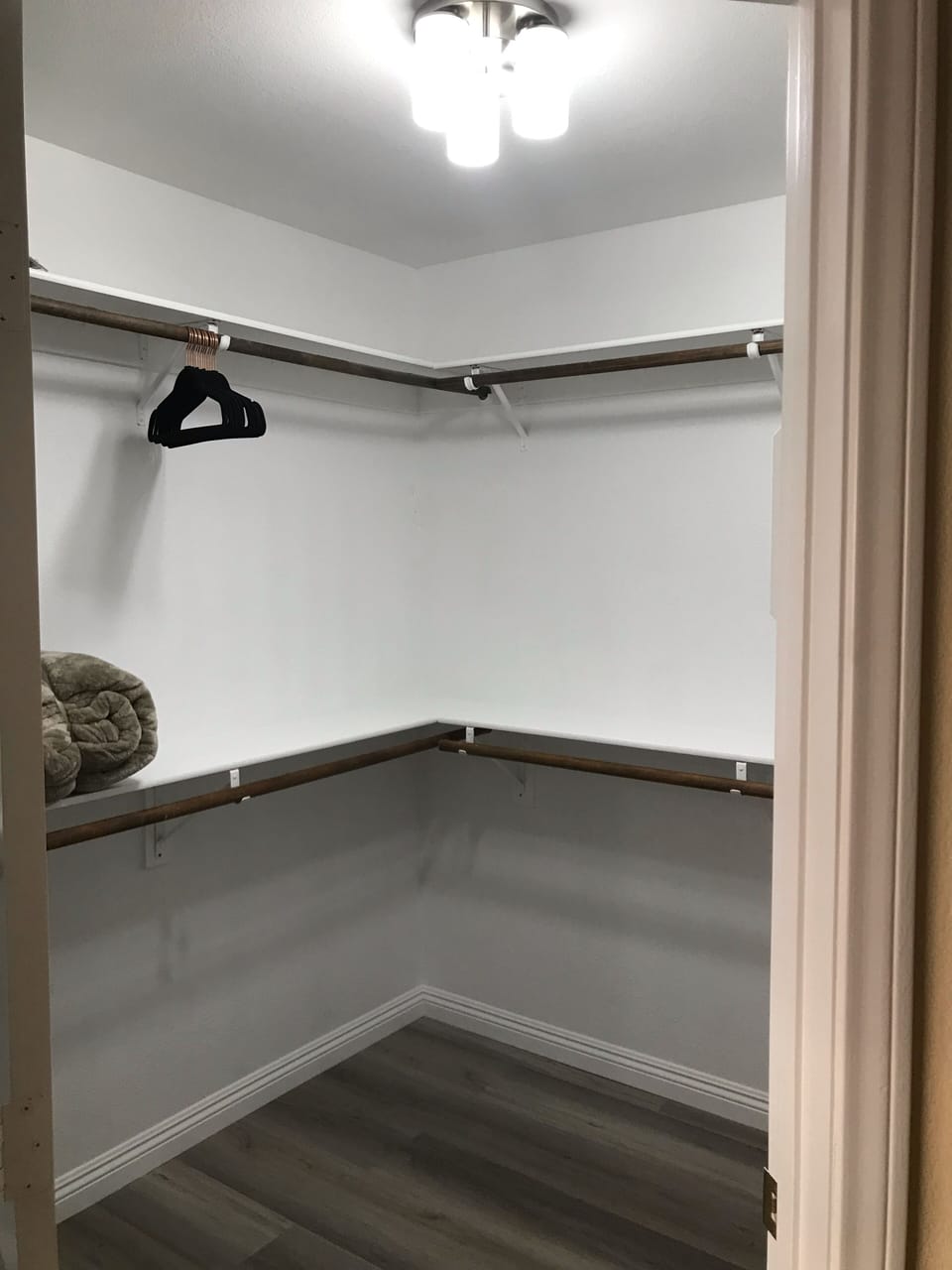 Spacious walk in closet off of master bedroom 