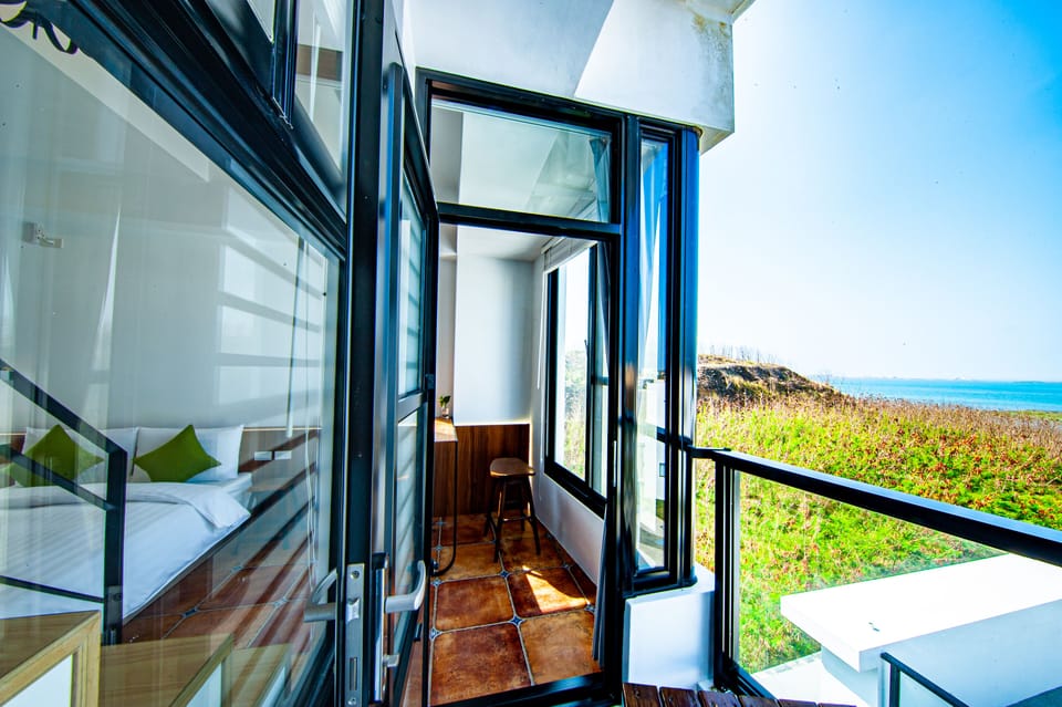 Basic Quadruple Room, Ocean View | Desk, blackout drapes, soundproofing, free WiFi