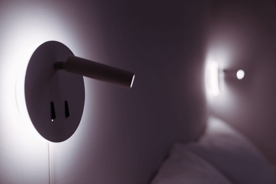 Premium bedding, down comforters, iron/ironing board, free WiFi