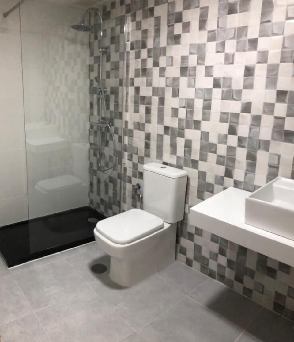 Shower, towels, soap, shampoo