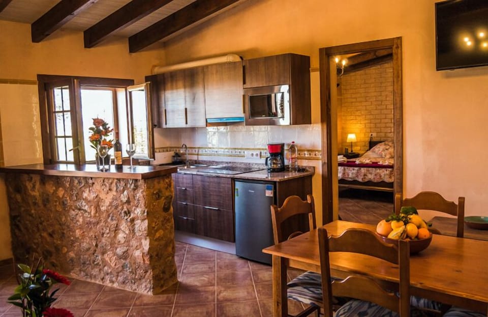 Superior Suite, Jetted Tub, Mountain View | Private kitchen | Full-size fridge, microwave, stovetop, dishwasher