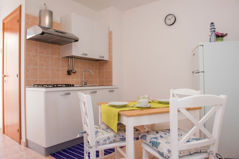 Standard Apartment, 1 Queen Bed, Sea View | Private kitchen | Full-size fridge, dishwasher, coffee/tea maker, cookware/dishes/utensils