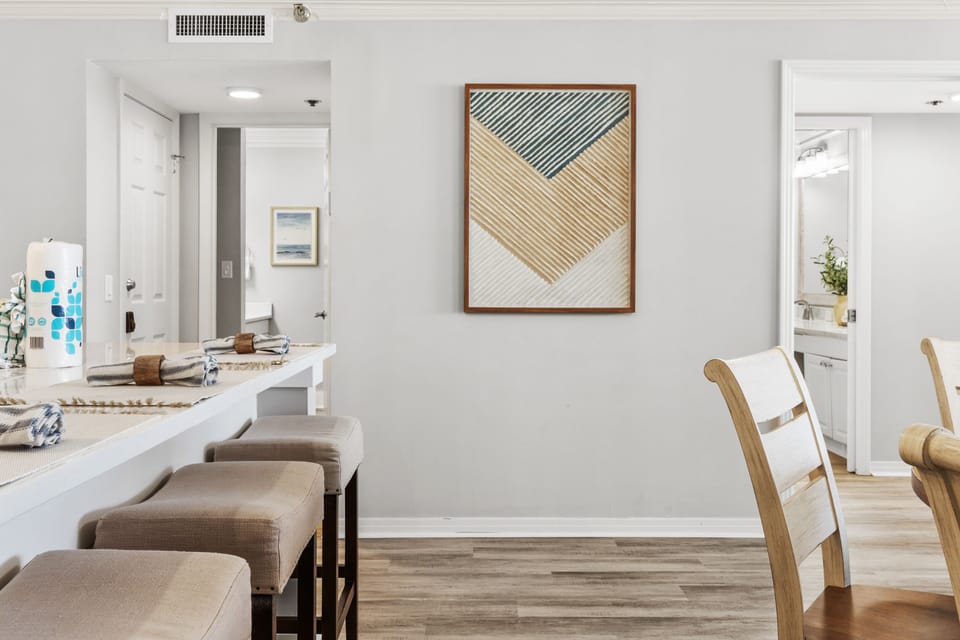 Dining area for six and additional bar seating for four