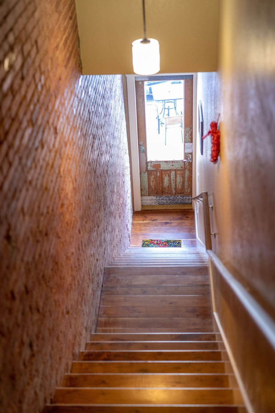 staircase leading to upstairs, and downstairs