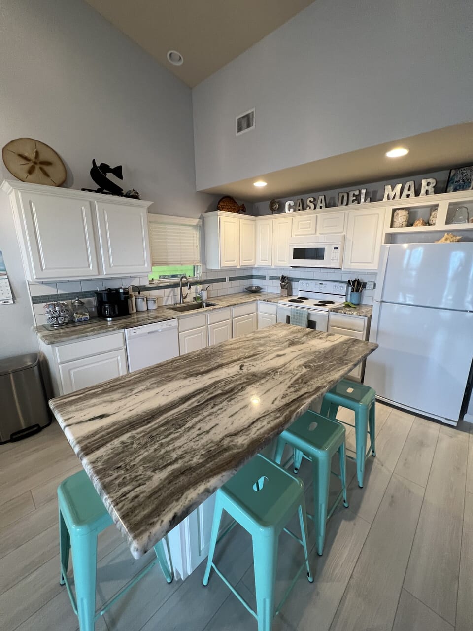 Another view of that beautiful kitchen that has all the cookware you need